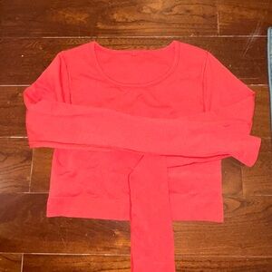 Lululemon ebb to street long sleeve. ribbed and cropped in pale raspberry